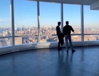 Gabriela's "husband" Zoltan (left) with agent, in upper floor apt. of 111 Murray