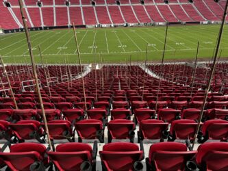 Bamboo poles attached to the seats of the L.A. Memorial Coliseum in preparation for Cai Guo-Qiang’s WE ARE daytime fireworks. Photo- Min Chen
