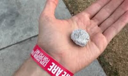 holding debris from 'We Are' fireworks performance